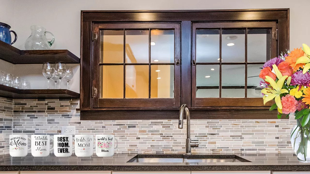 zoom background image of kitchen with best mom in the world mugs and fowers